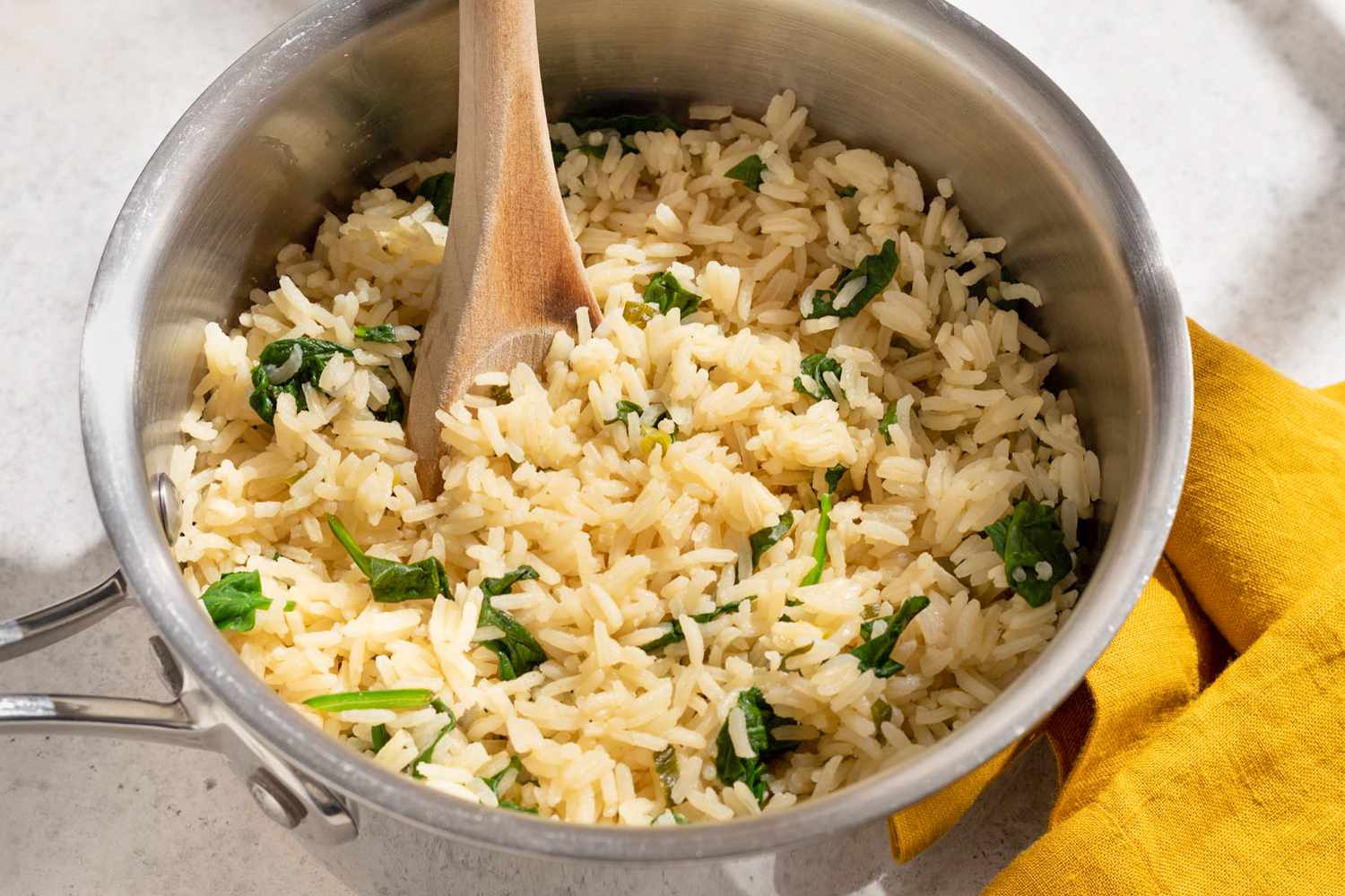 Overhead view of a pot with 4-Ingredient Lemony Spinach Rice