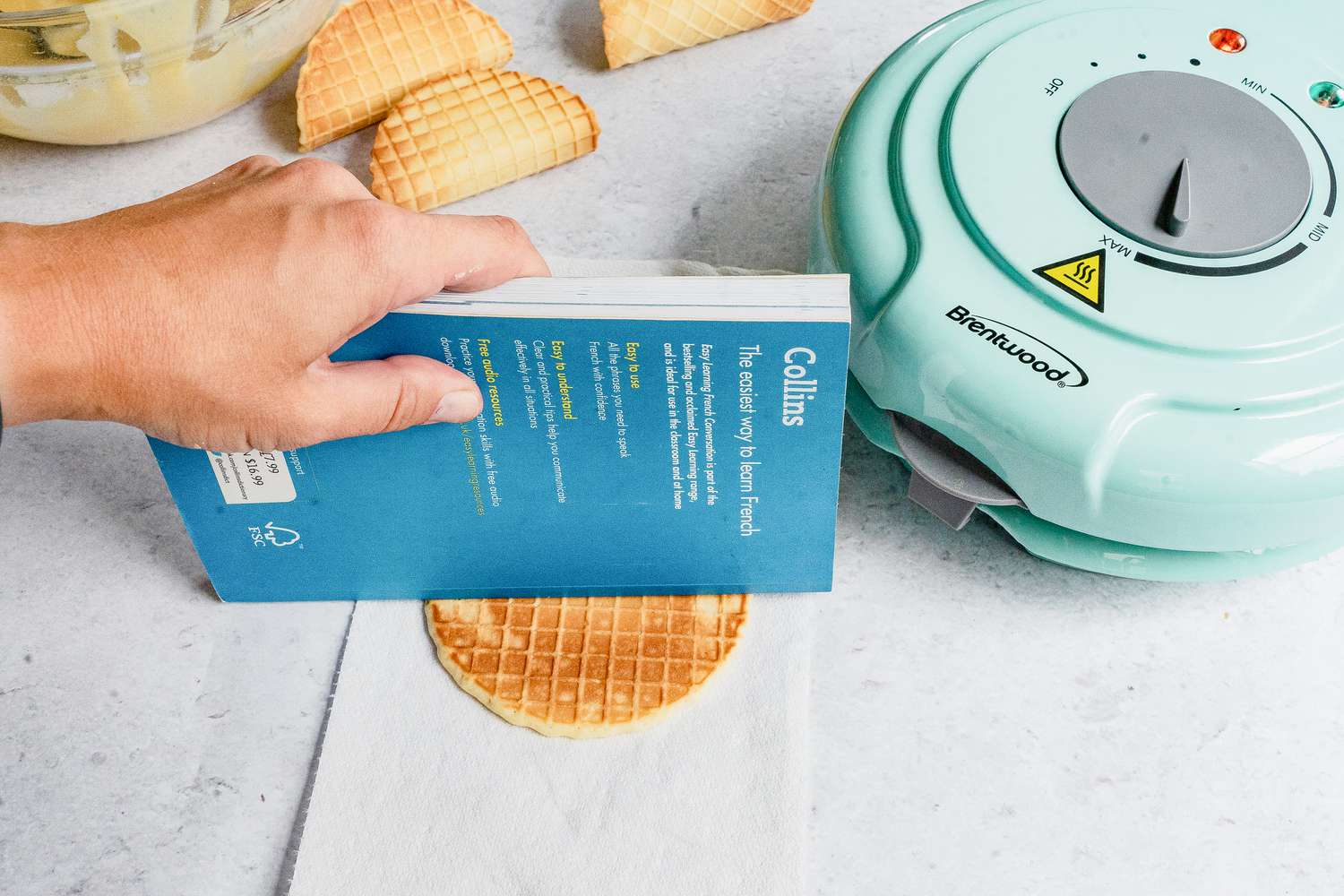 Place book spine-side down on top of the waffle shell.