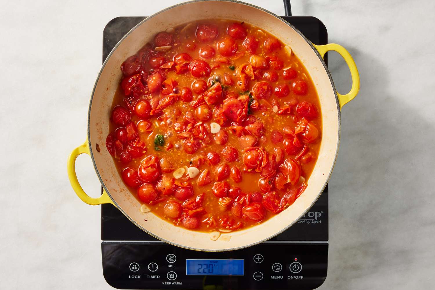 pomodoro sauce bubbling in the dutch oven for easy pasta pomodoro recipe