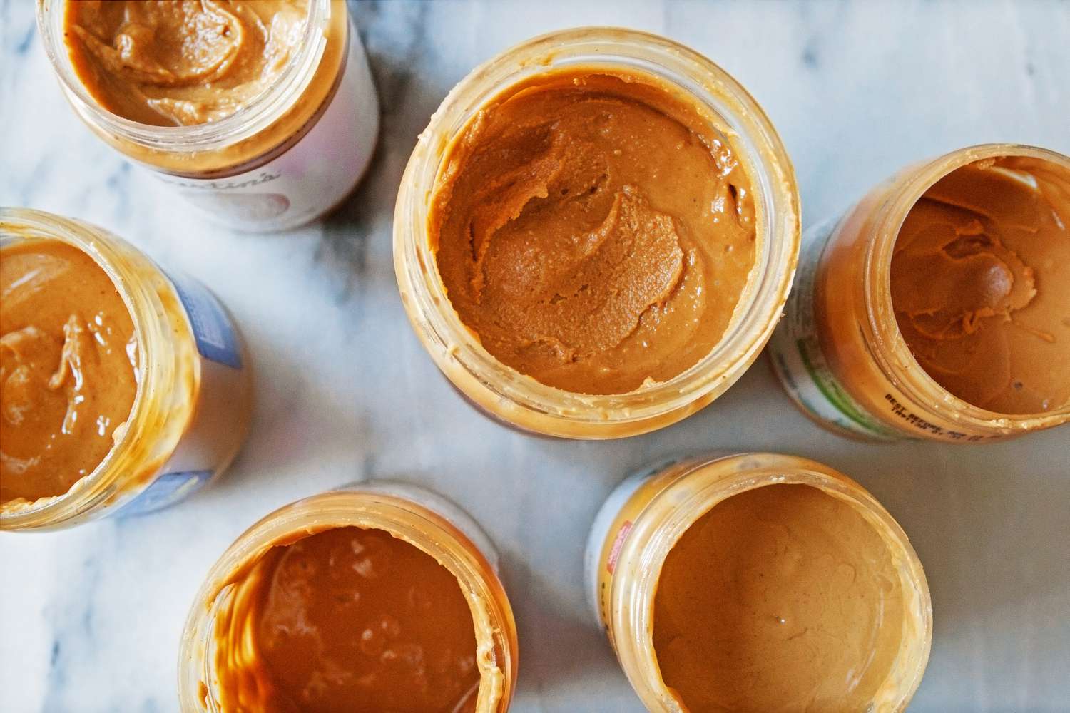 Different types of peanut butter in jars