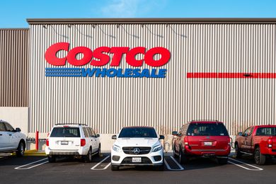 Parking lot with cars in front of a Costco Wholesale store