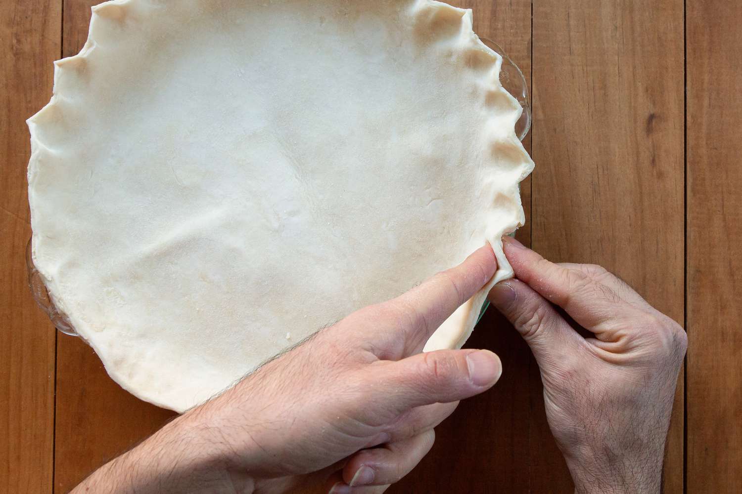 Crimping the top crust of an Easy Lemon Pie.