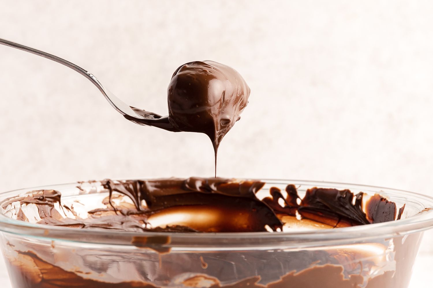 Date Lifted on a Fork After Dipped and Covered in Chocolate 