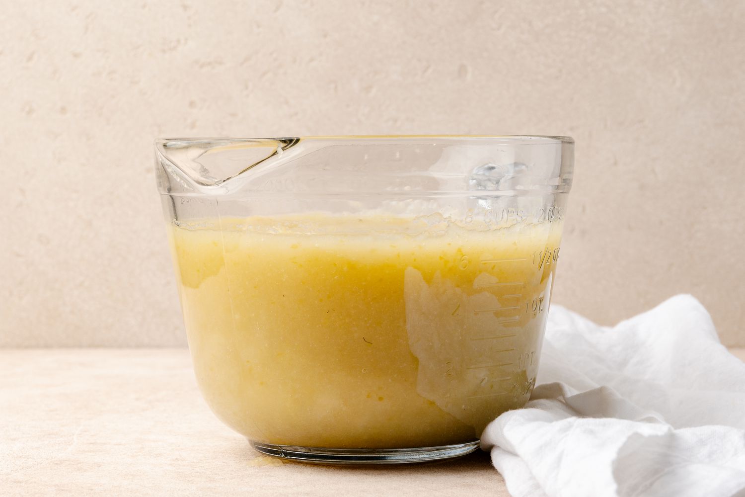 Measuring Cup with Sieved Apples for Old Fashion Apple Butter