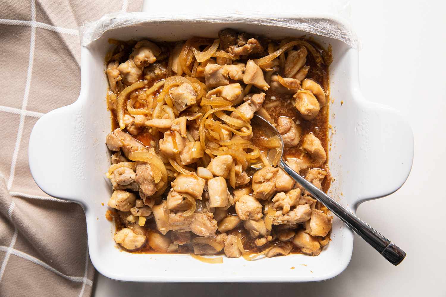 Plastic Wrap Removed and Microwave Oyakodon Stirred Using a Spoon