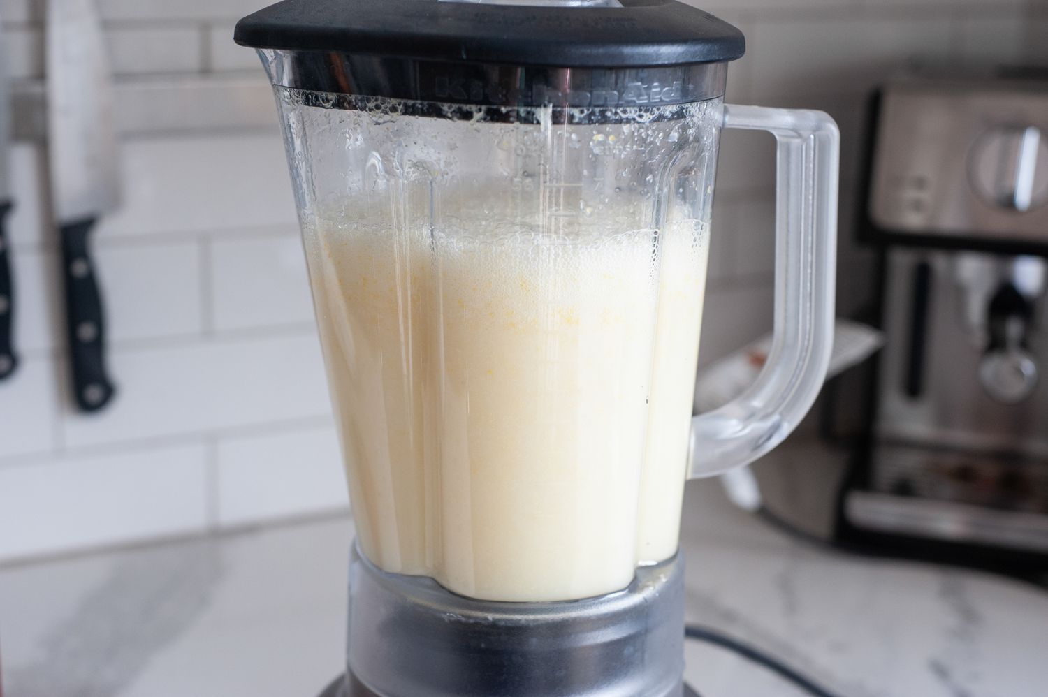 Blended lemonade in a blender pitcher.