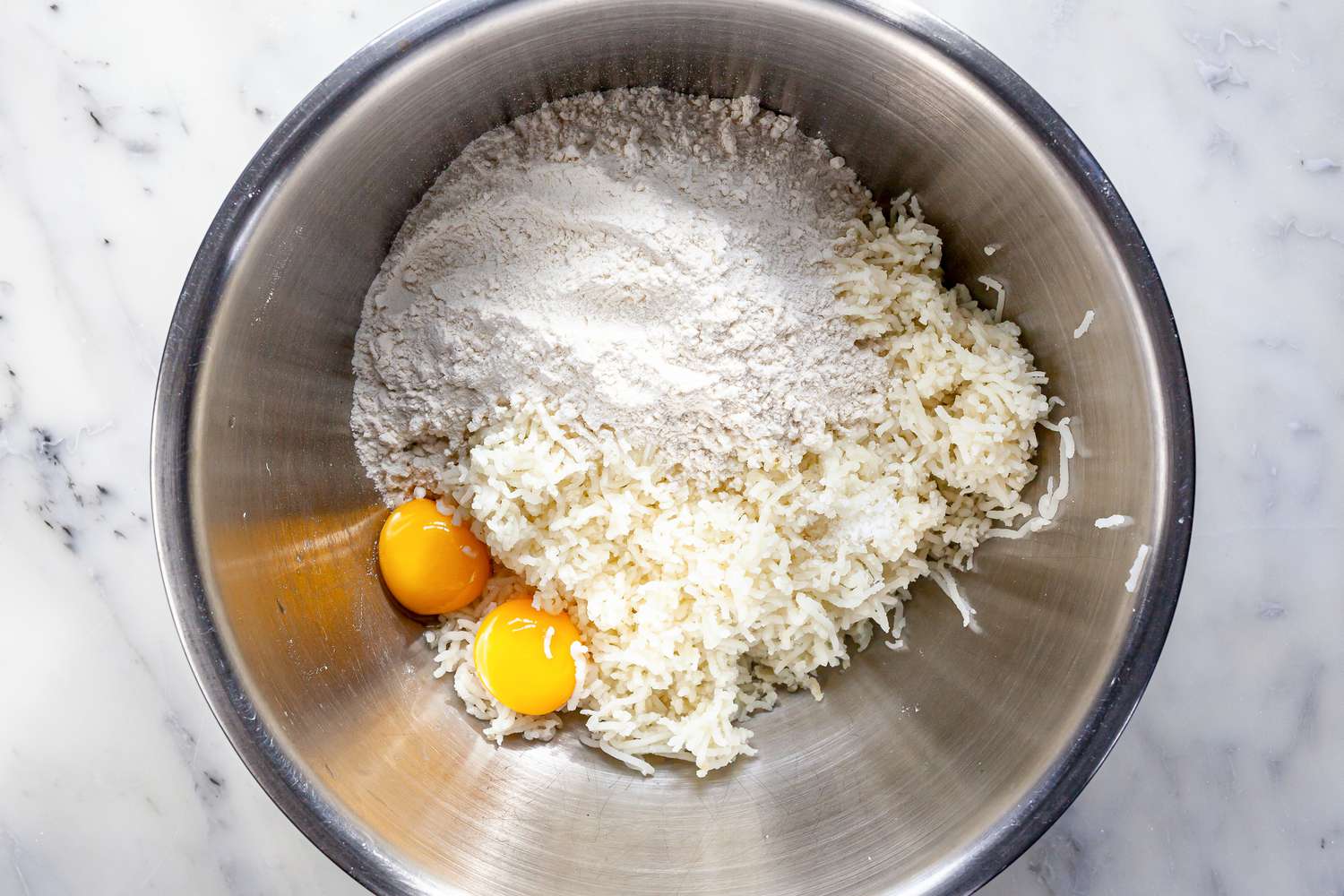 How to make Potato Gnocchi dough with eggs, cooked mashed potatoes, and flour