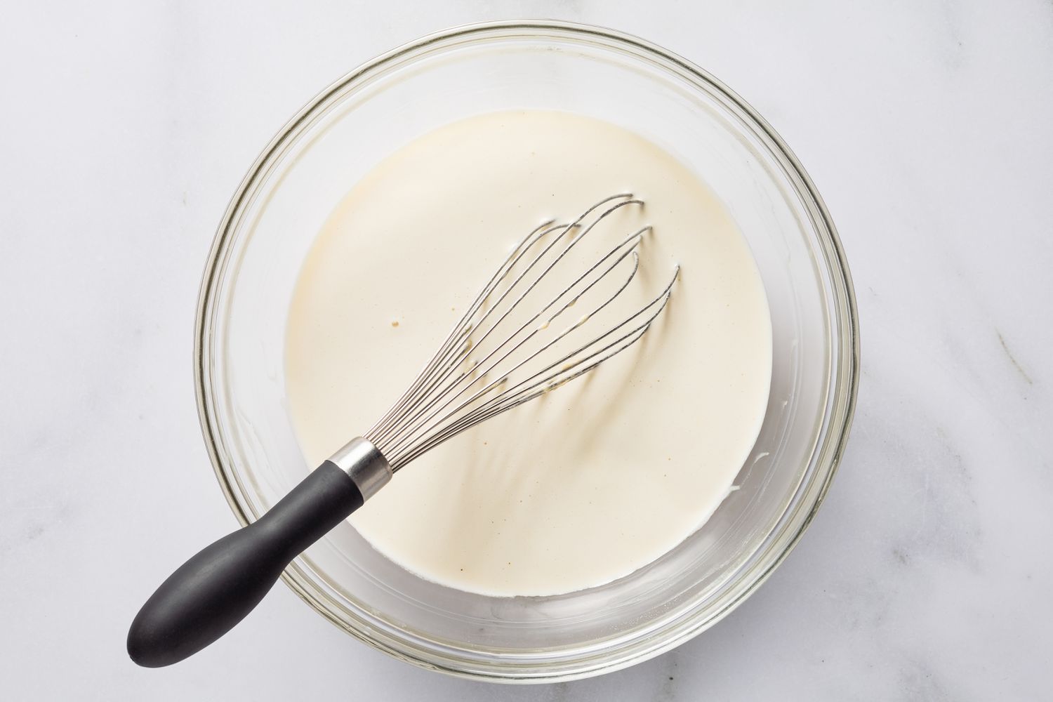 egg yoke and milk batter in a bowl for magic cake (gÃ¢teau magique) recipe