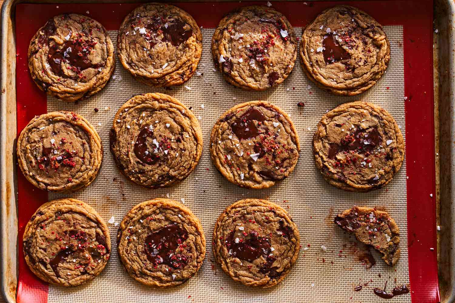 Sheet pan filled with just baked adobo chocolate chip cookies