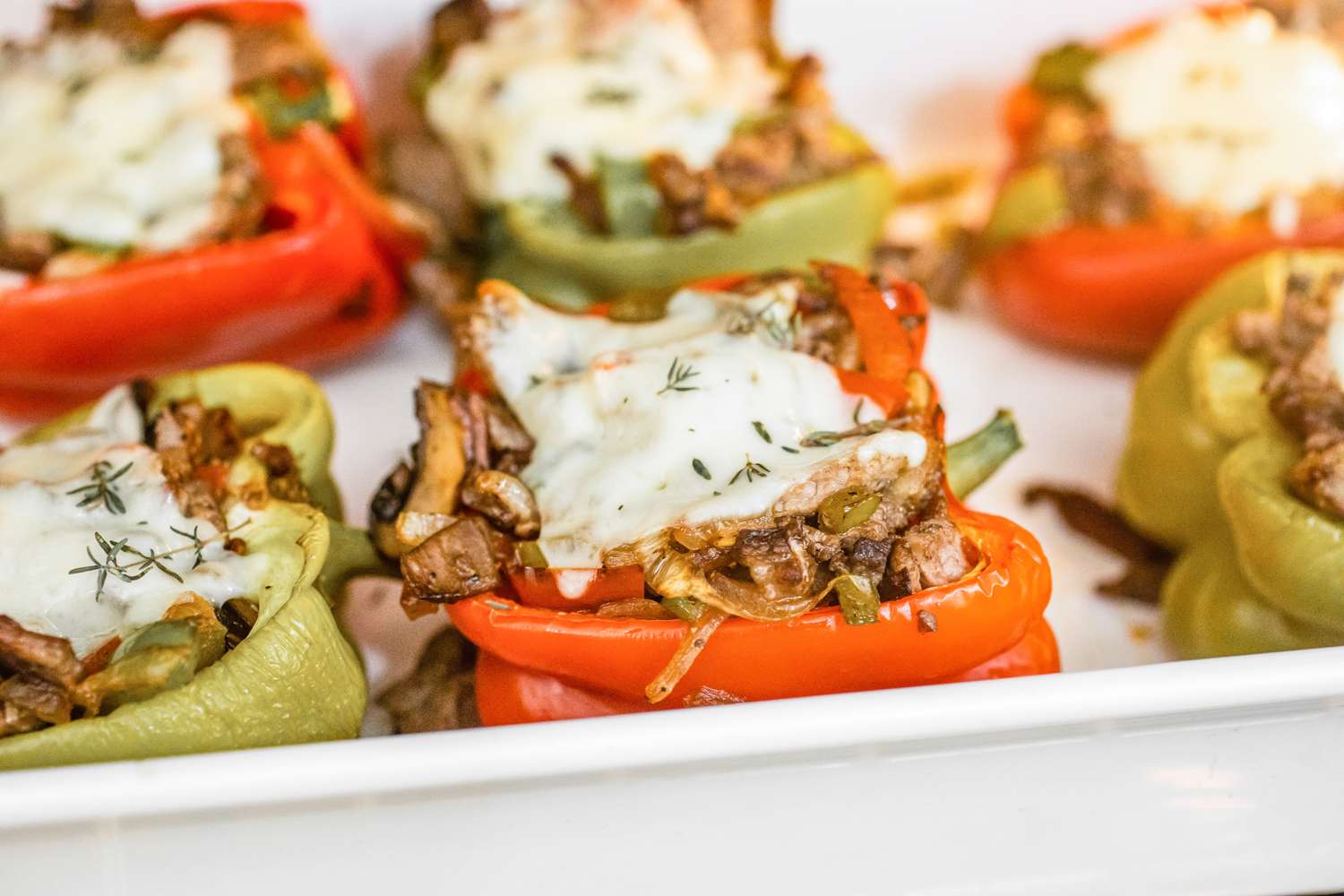 Philly Cheesesteak Stuffed Peppers in a Casserole Dish
