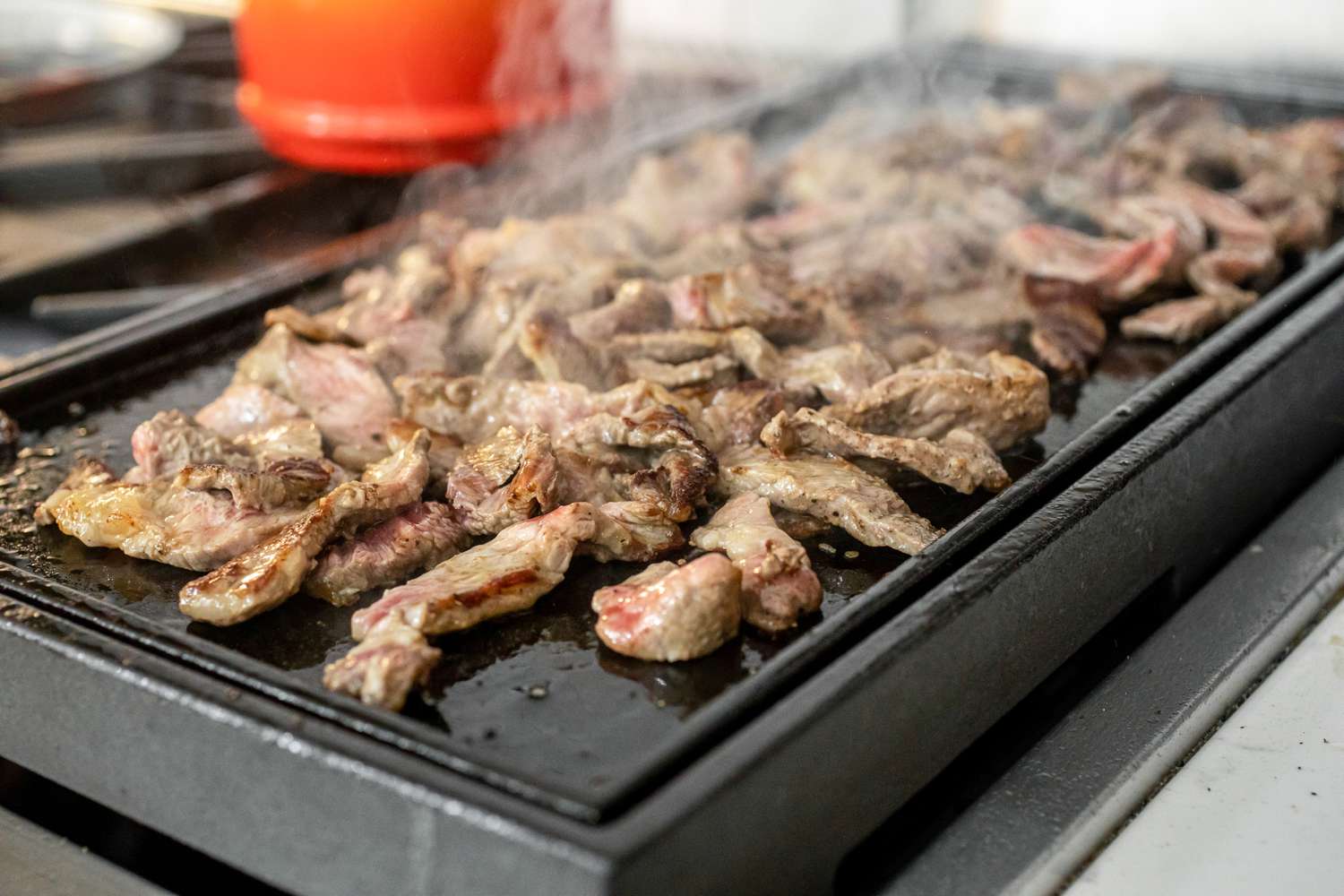 Steak for Philly Cheesesteak Stuffed Peppers Cooked on a Griddle 