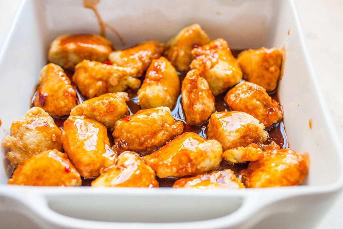 Firecracker Chicken Recipe toss the chicken in sauce