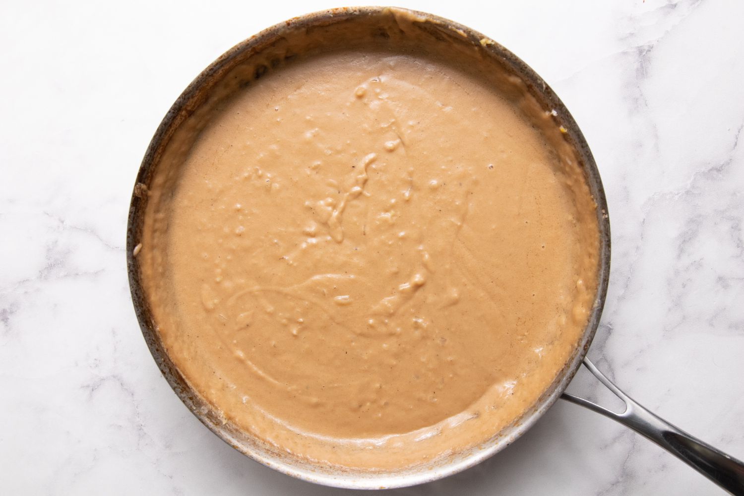 Satay Sauce in Pan for Smoked Whole Cauliflower with Spiced Soy Butter and Satay Sauce