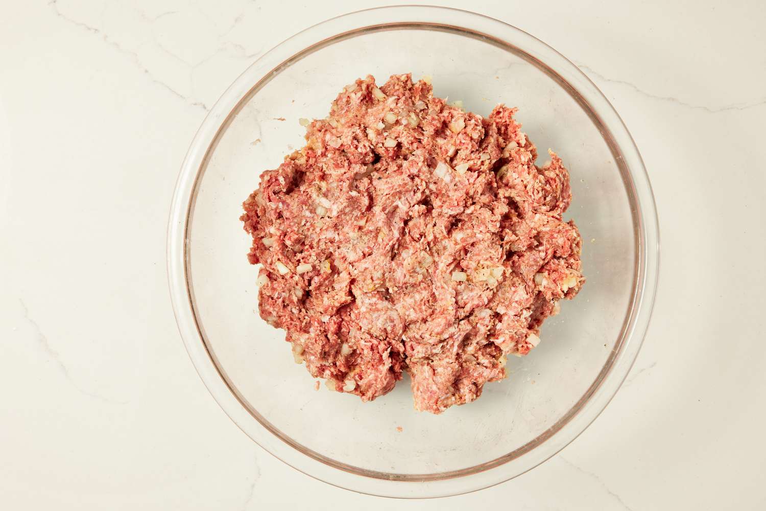 Copycat Ikea Swedish meatballs mixture in a bowl, all mixed together