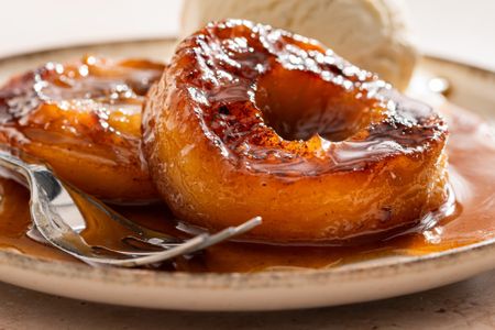 close up of Melting Apples on a small dessert plate with a fork