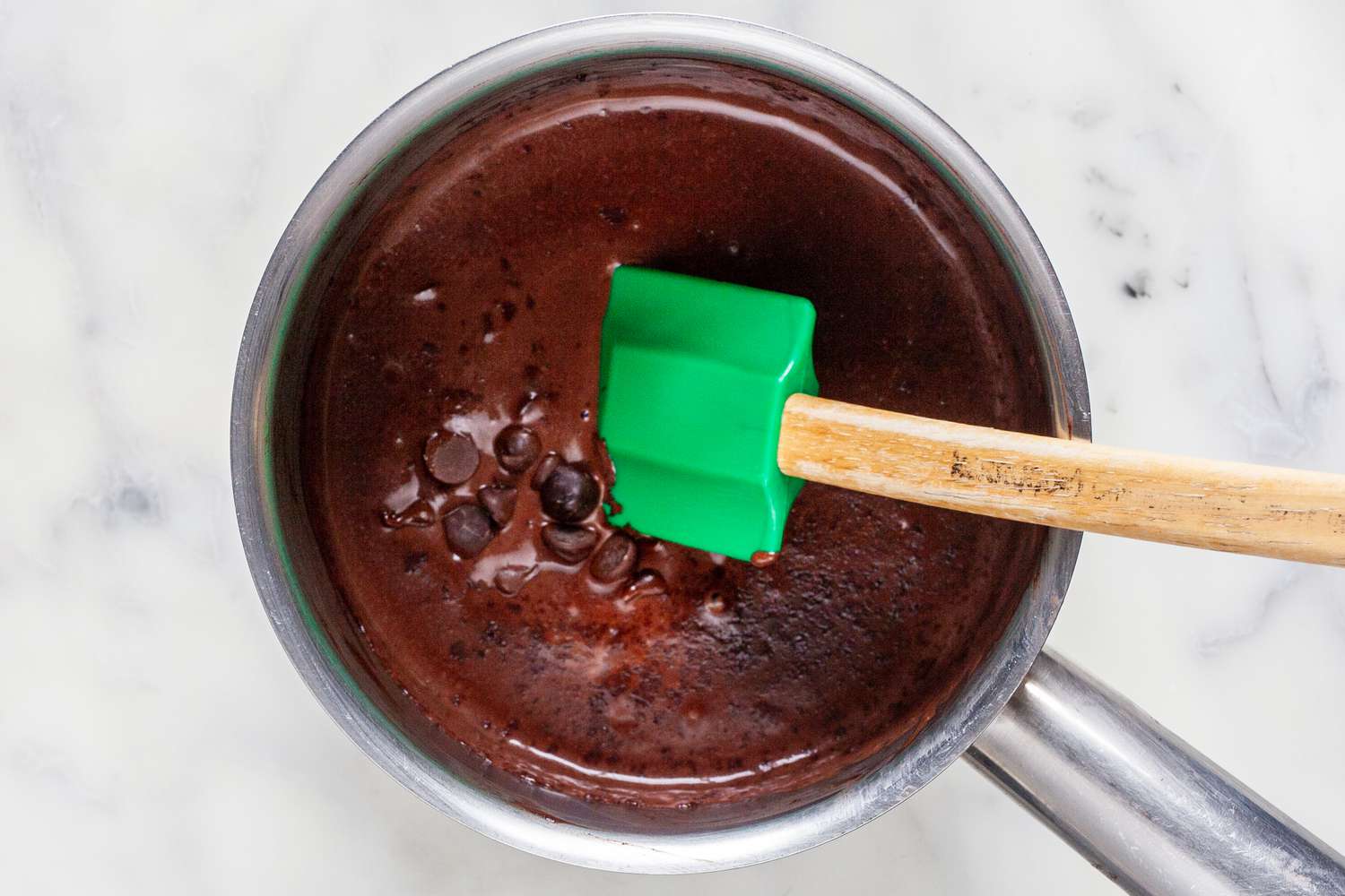 Stirring chocolate into the custard for mexican chocolate