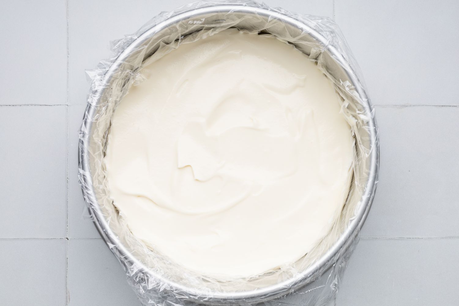 Assembling First Layer of Oreo Ice Cream Cake: No Churn Ice Cream Layer Smoothened After Covering the Milk Dipped Cookie Layer