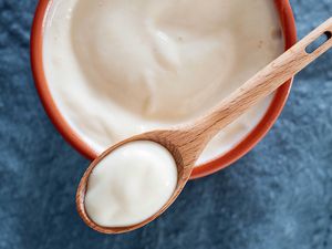 homemade mayo on a wooden spoon