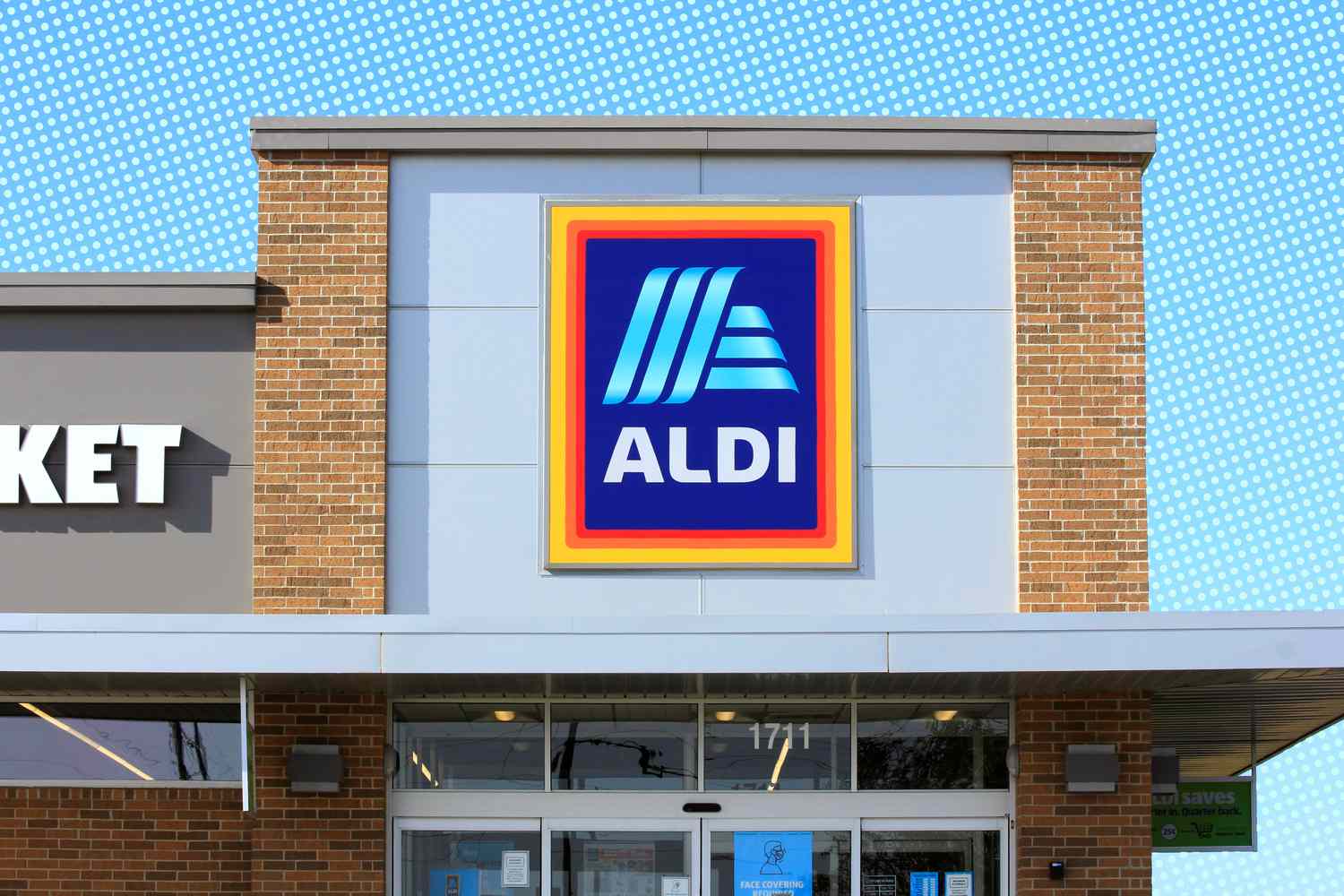 The storefront of an Aldi supermarket with a visible logo sign