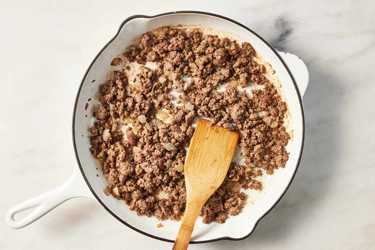 ground beef cooked in a skillet for homemade hamburger helper recipe