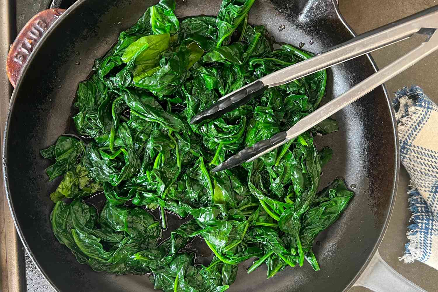 Spinach Wilted in a Skillet for Vegan Creamed Spinach Recipe