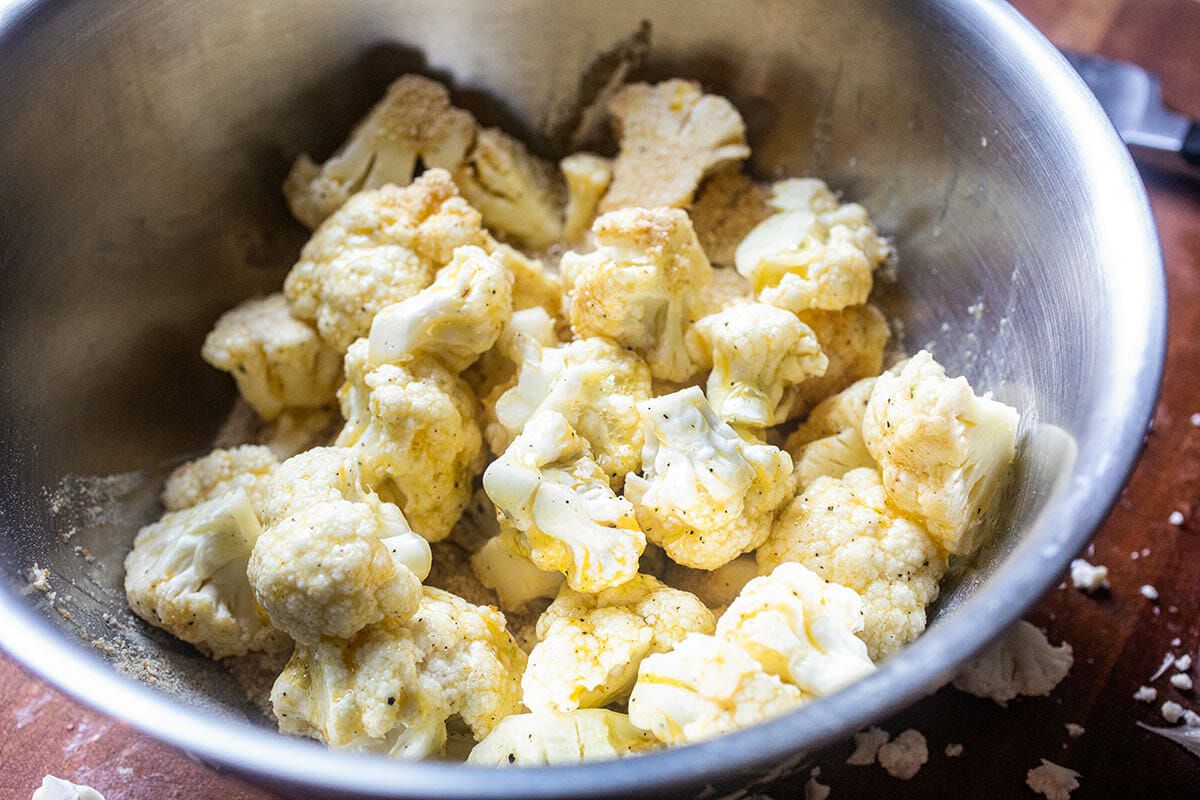 Cauliflower florets in a metal bowl to make Air Fryer Buffalo Cauliflower Bites.