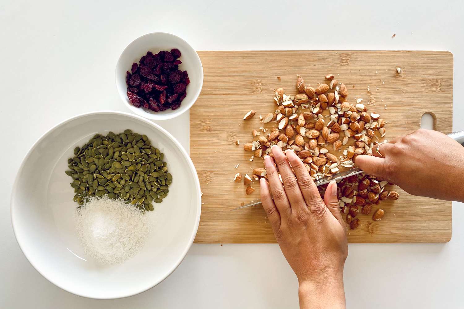 Chopping nuts to make Granola Bars.