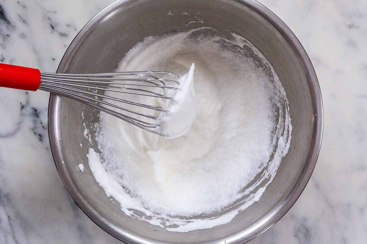 Breakfast Casserole with Grits - whisk whipping egg whites