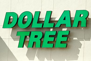 Dollar Tree storefront sign on a beige wall