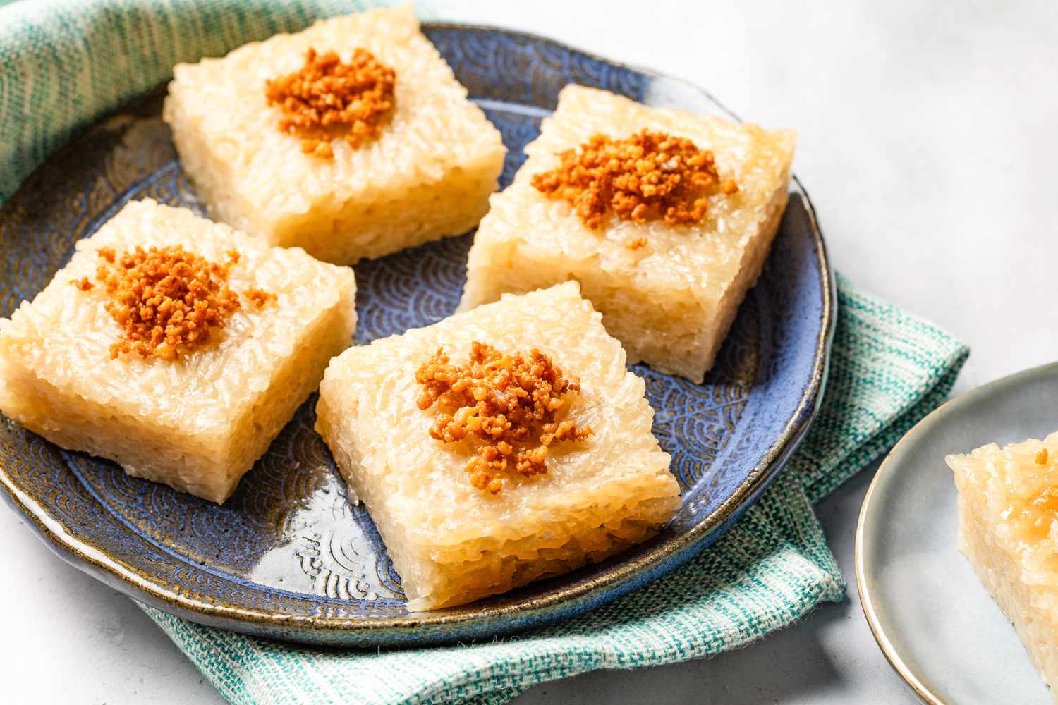 biko (Filipino sticky rice cake) slices on a plate