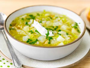 Swedish Cabbage Soup in a bowl with a spoon