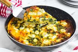 Spinach Frittata Raised from Pan with More Frittata