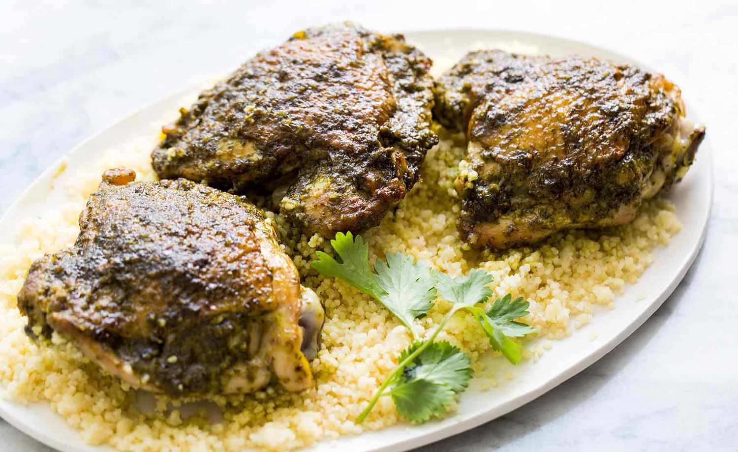 Chermoula Chicken on top of couscous