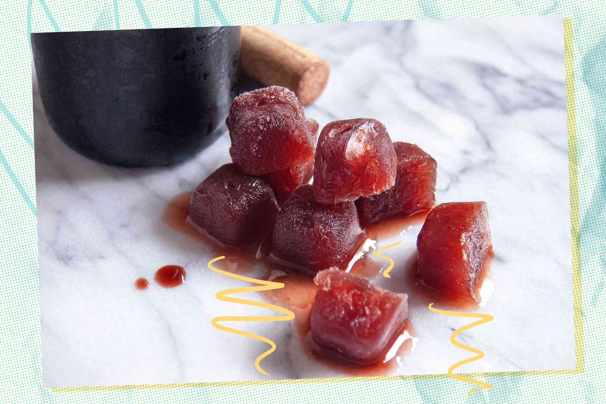 Frozen wine cubes slowly melting on a table