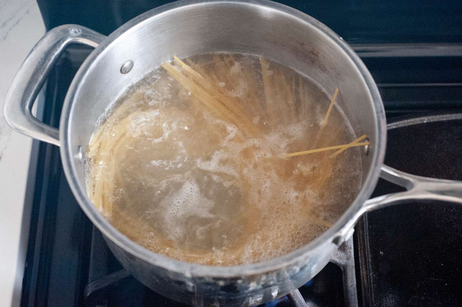 Boil spaghetti for chicken carbonara