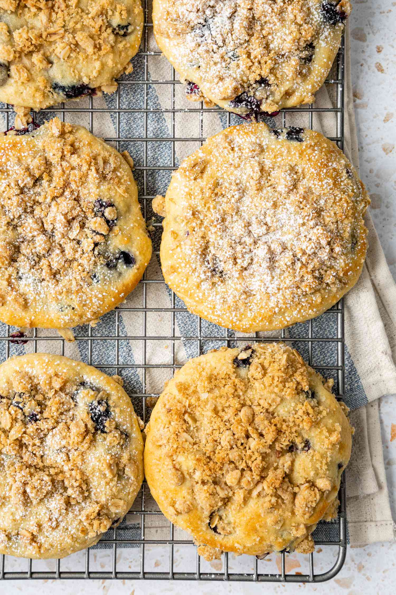 Blueberry Muffin Tops Cooling on a Wire Rack