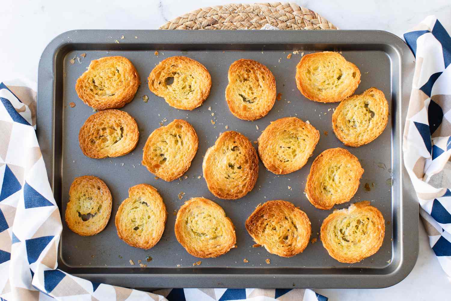 Toasted Bread on Baking Sheet for Caesar Salad Recipe