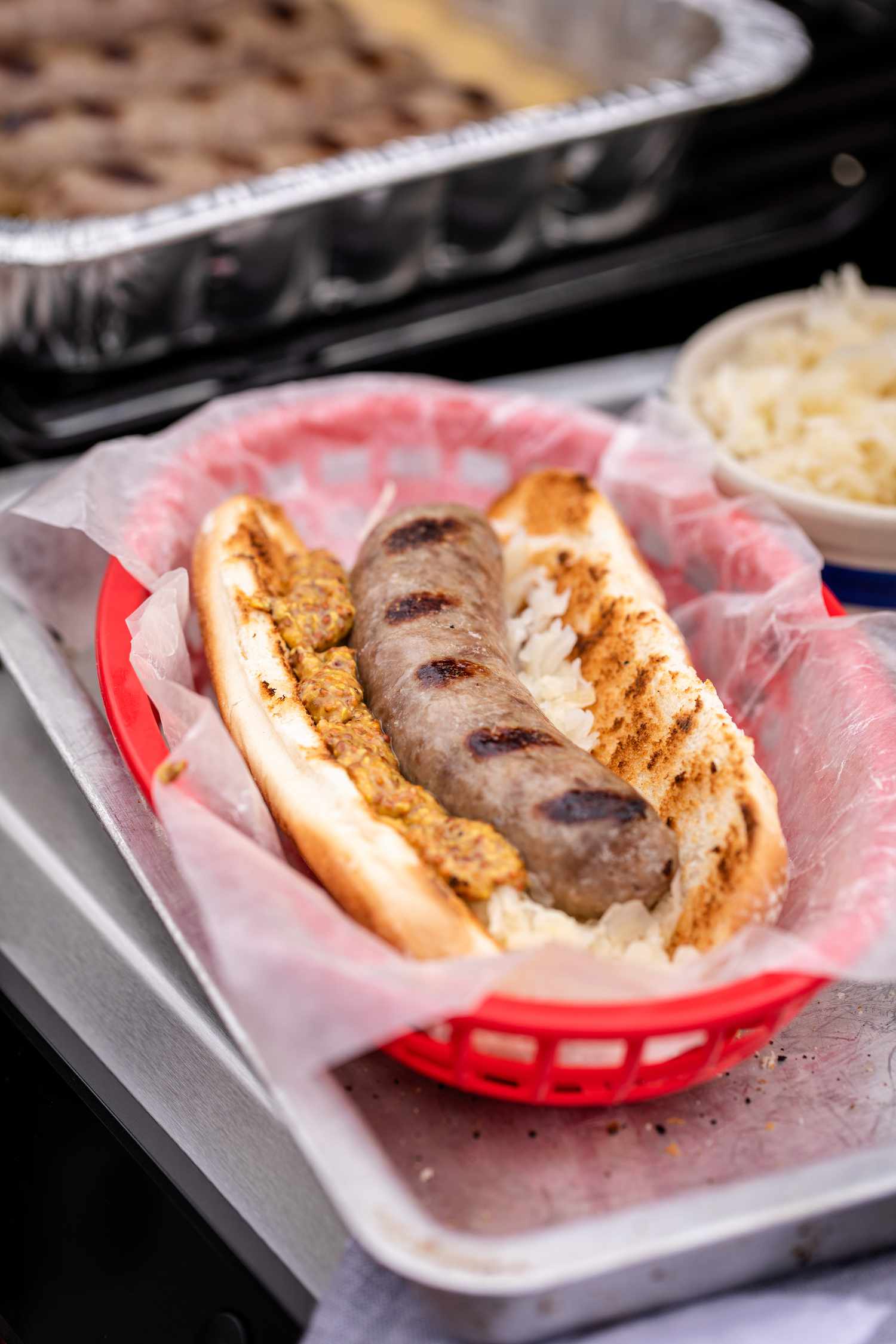 Beer Brats Topped with Sauerkraut and Mustard