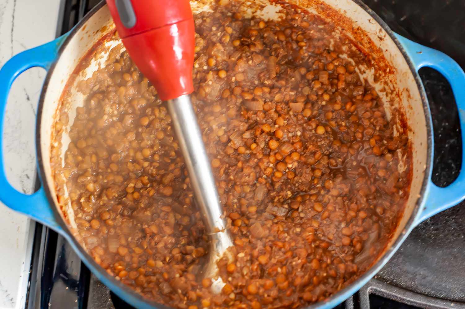 Immersion Blender Used to Pulse Vegan Cincinnati Chili in a Dutch Oven