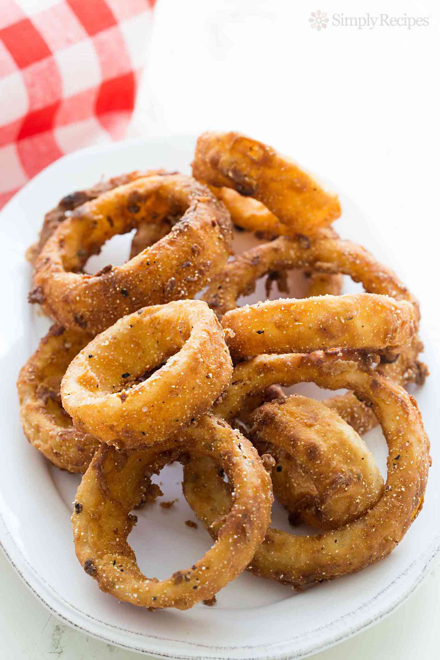 A plate of breaded onion rings
