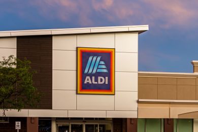 Aldi storefront with logo on the building