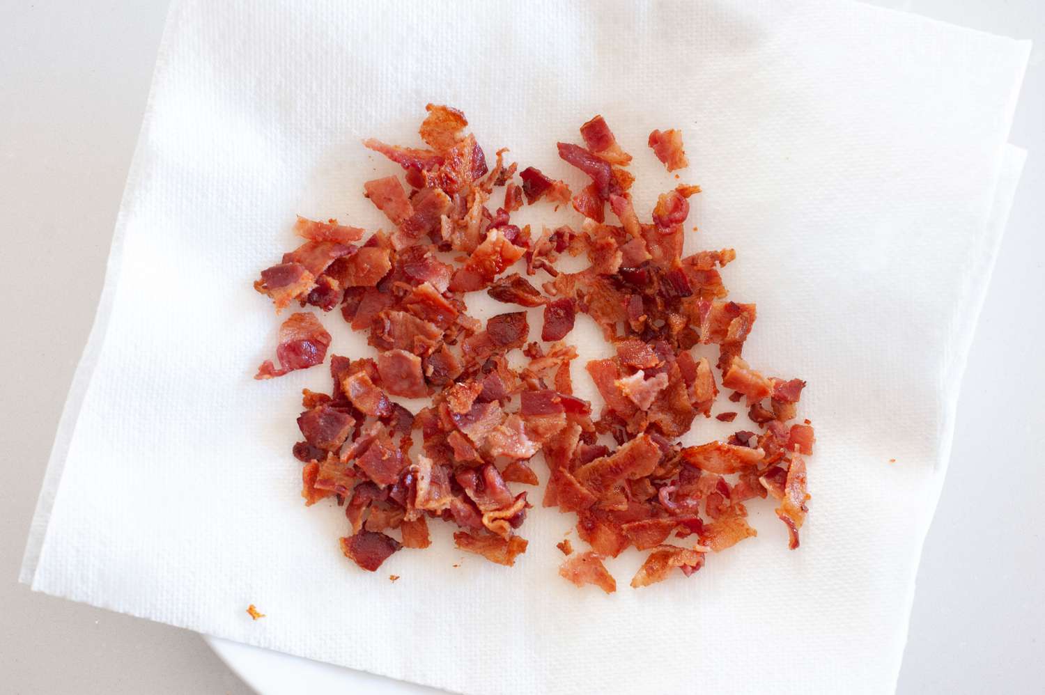 Bacon on paper towel for twice baked potato casserole
