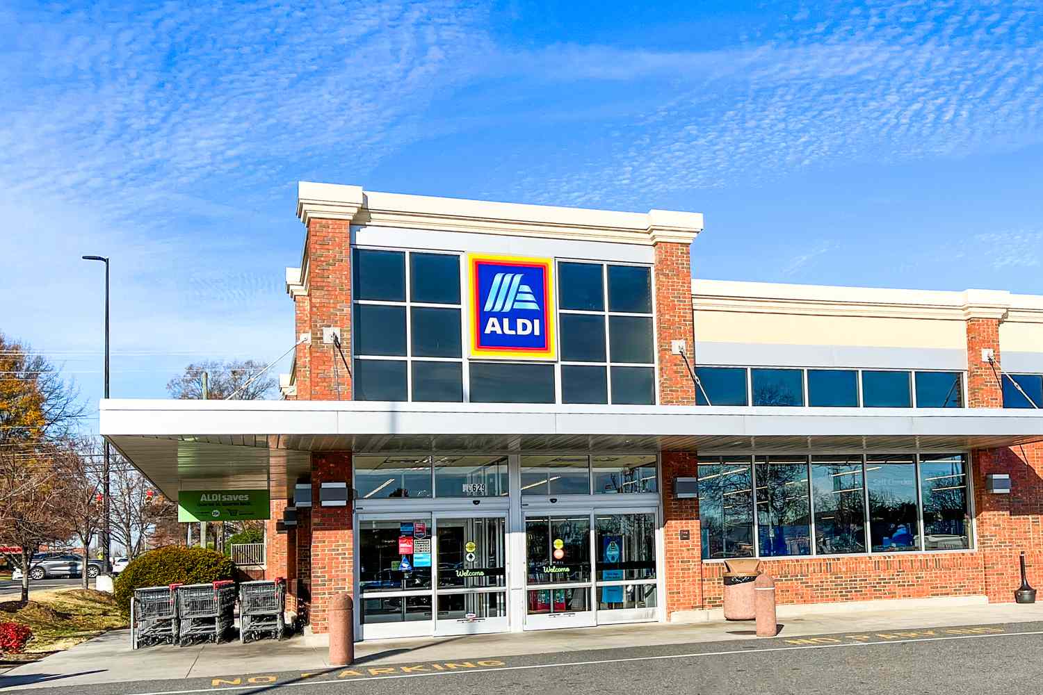 The exterior of an Aldi supermarket entrance