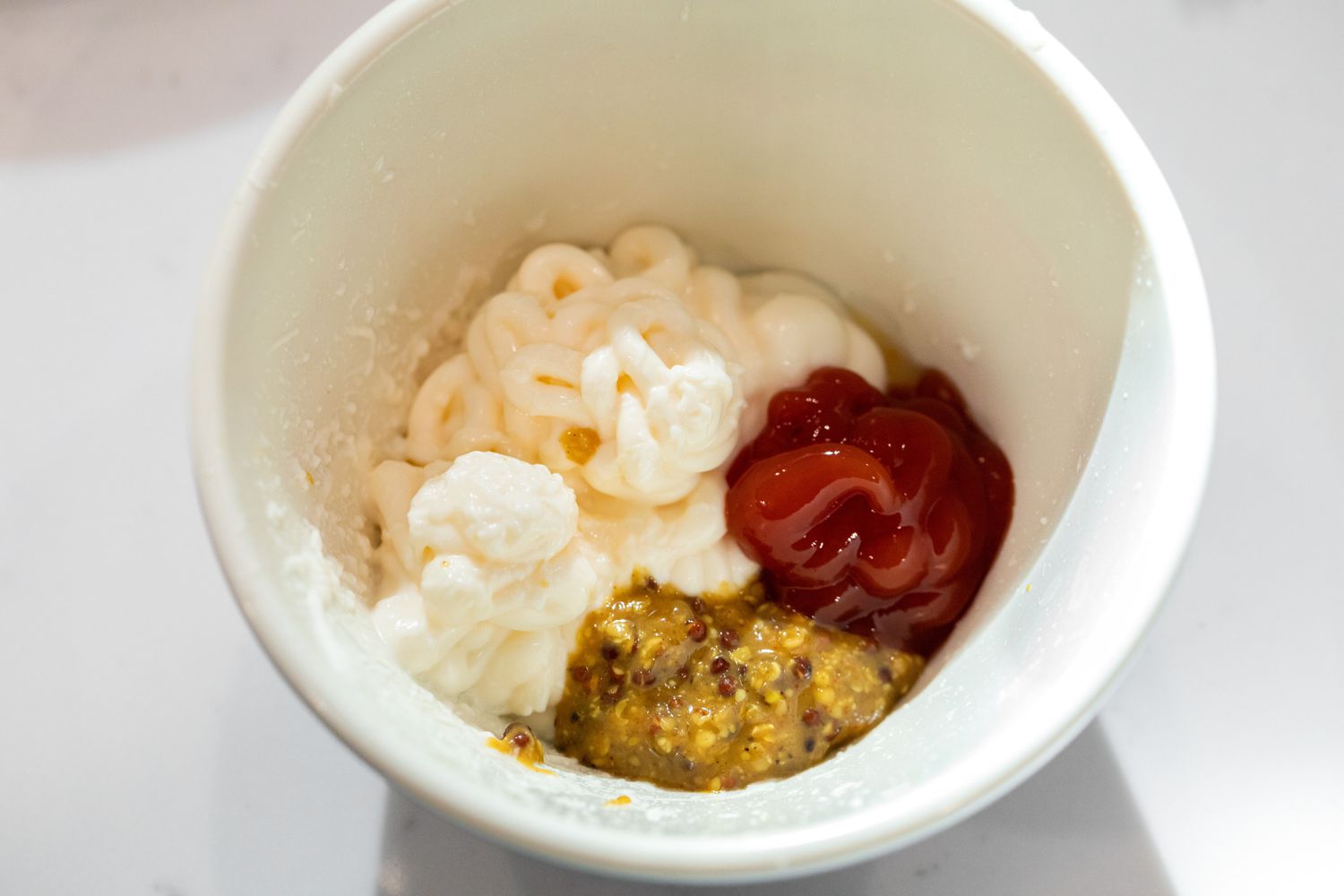 Bowl of Dijon Mustard, Ketchup, and Mayonnaise for Burger Sauce 