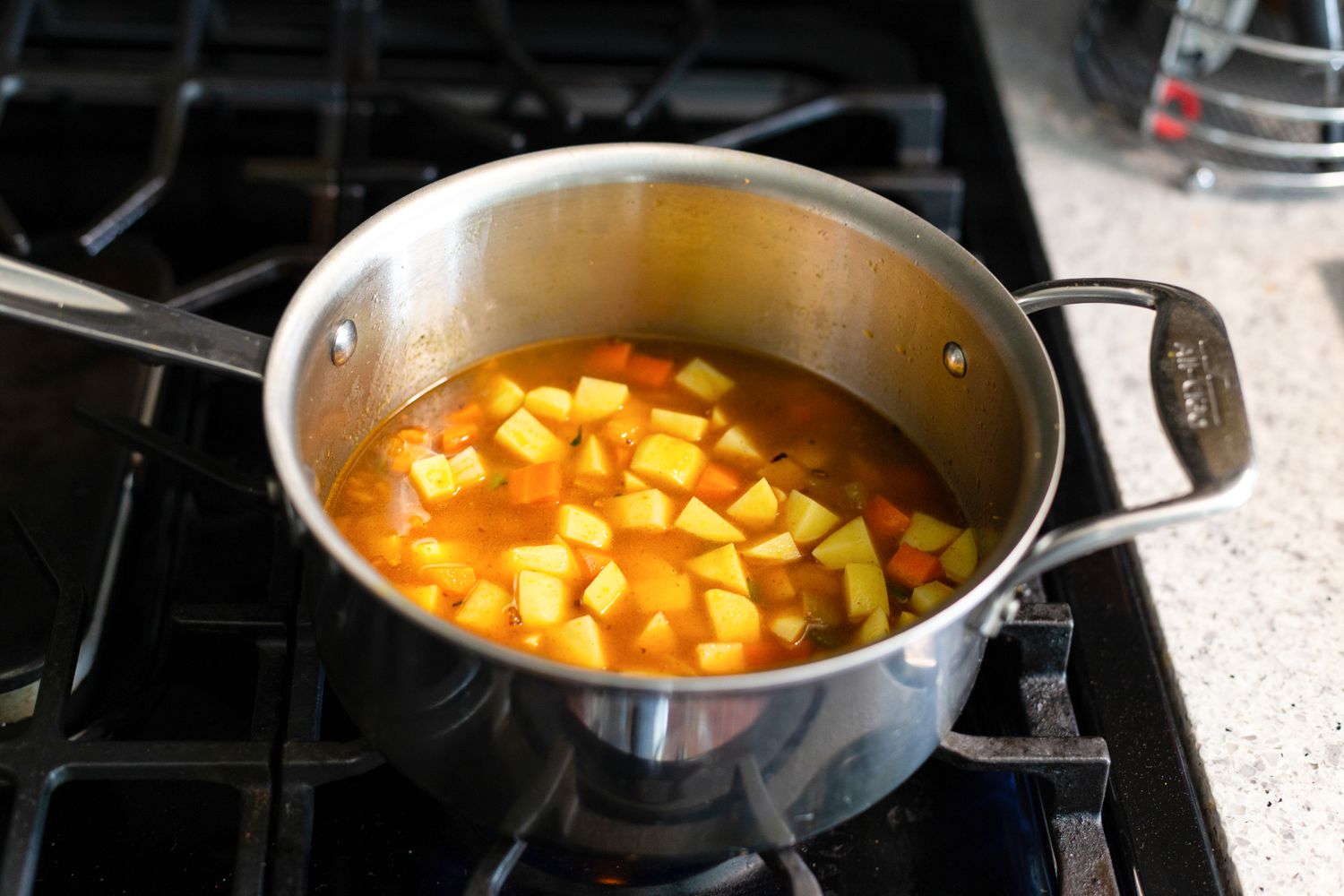 Cooking veggies for vegan queso recipe