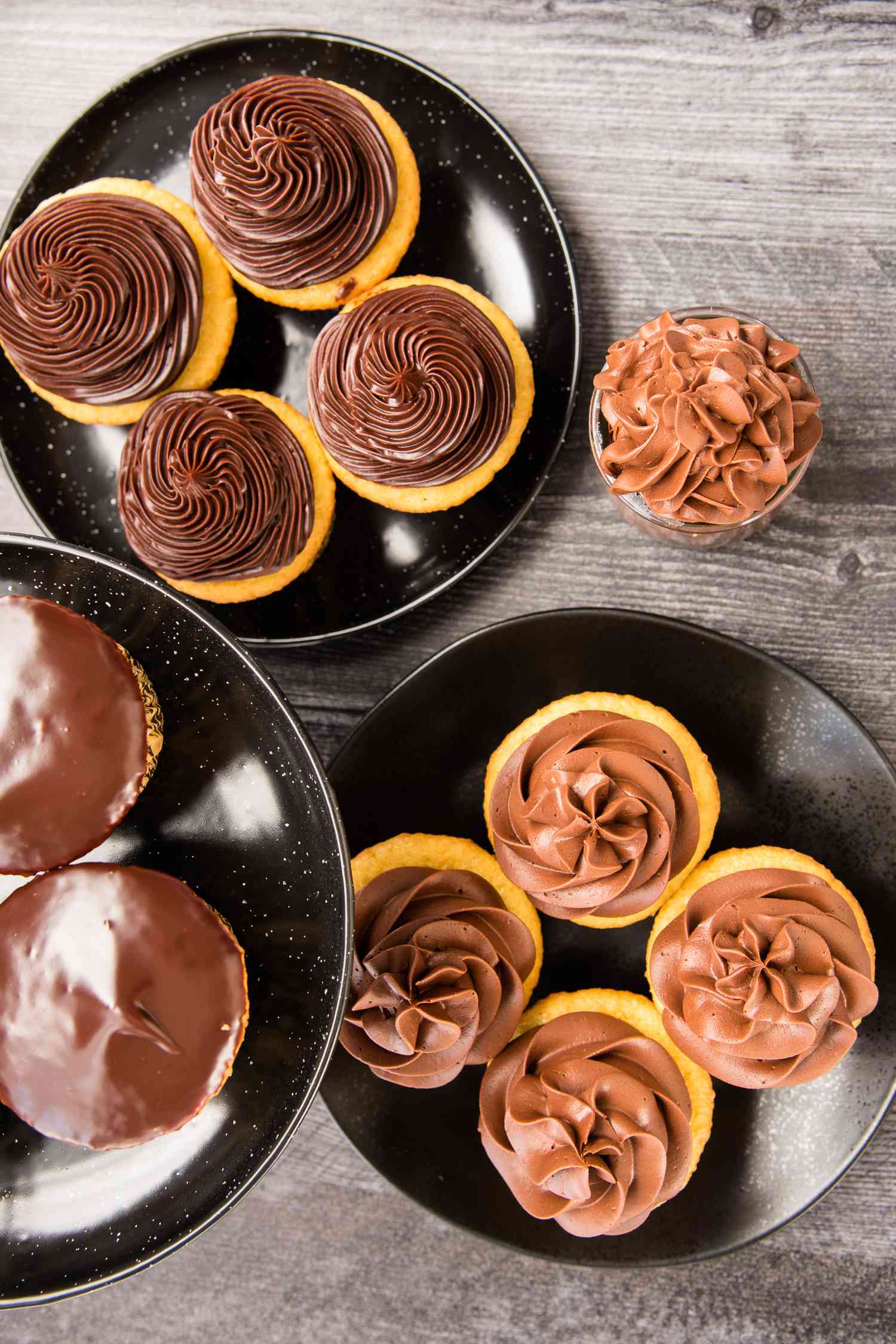 Overhead view of the perfect chocolate ganache recipe on cupcakes.