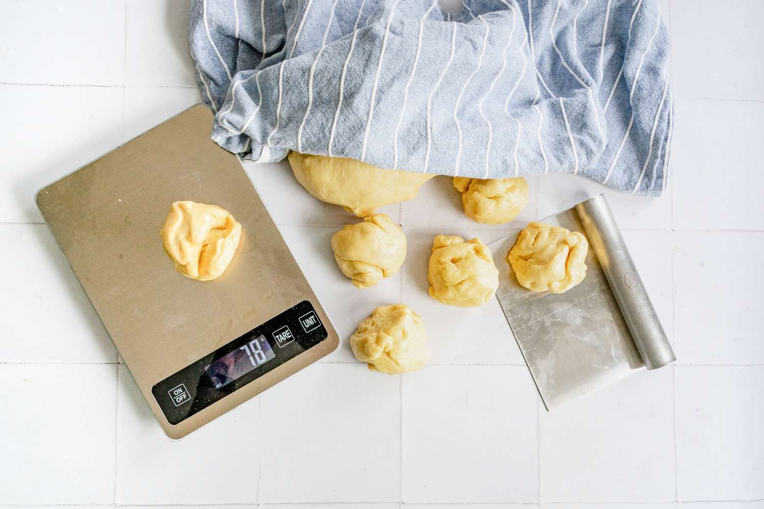 Challah Roll Dough Measured on Scale and Divided into 12 Pieces