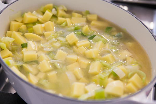 Potato Leek Soup add the potatoes to the soup pot