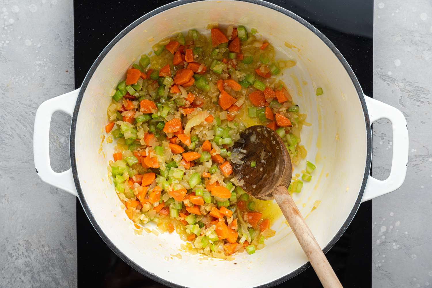 Celery, Carrots, and Onions Sautéed in a Dutch Oven Pot for Mercimek Corbasi Recipe