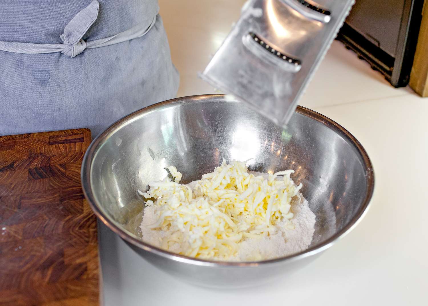Grated Butter Method: Grated Butter Added to Bowl of Dry Ingredients for Made by Hand Pie Dough